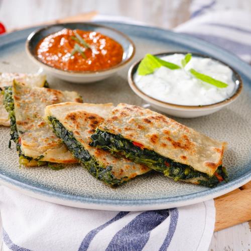 Spinach gözleme with dill kuru cacık and acuka