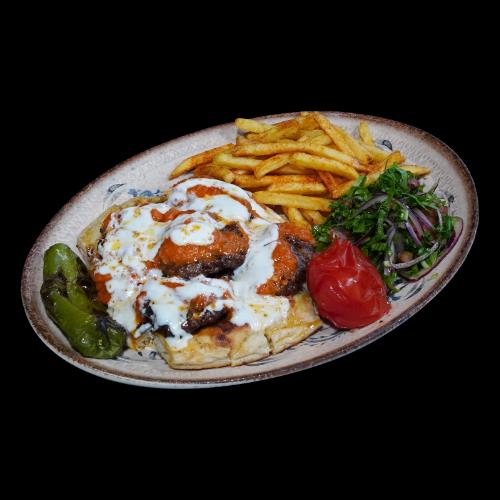 Bazlama with tomato sauce and meatballs
