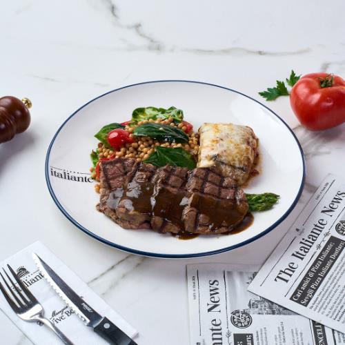 Beef Tenderloin and Orzotto on a Bed of Asparagus