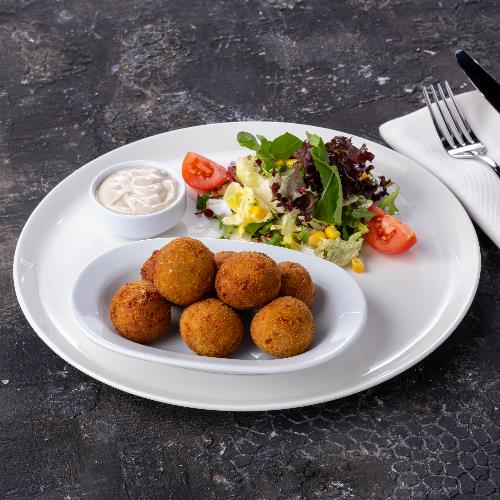 Falafel with Mediterranean greens and tahini yogurt dip