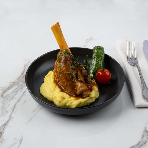 Over low heat Cooked Lamb shank