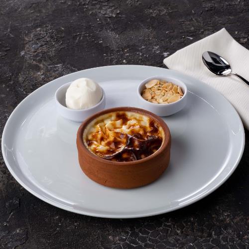 Mastic-Flavored Baked Rice Pudding with vanilla ice cream