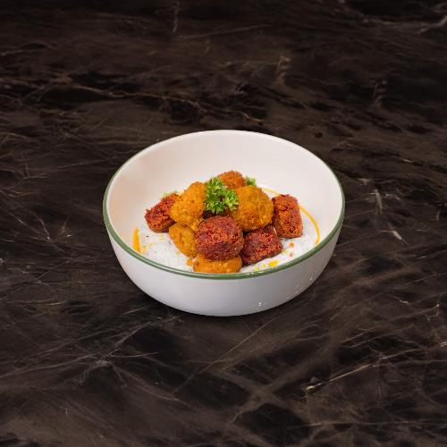 Crispy vegetable balls with yogurt dip