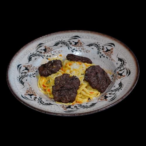Spaghetti with meatballs and cheese sauce